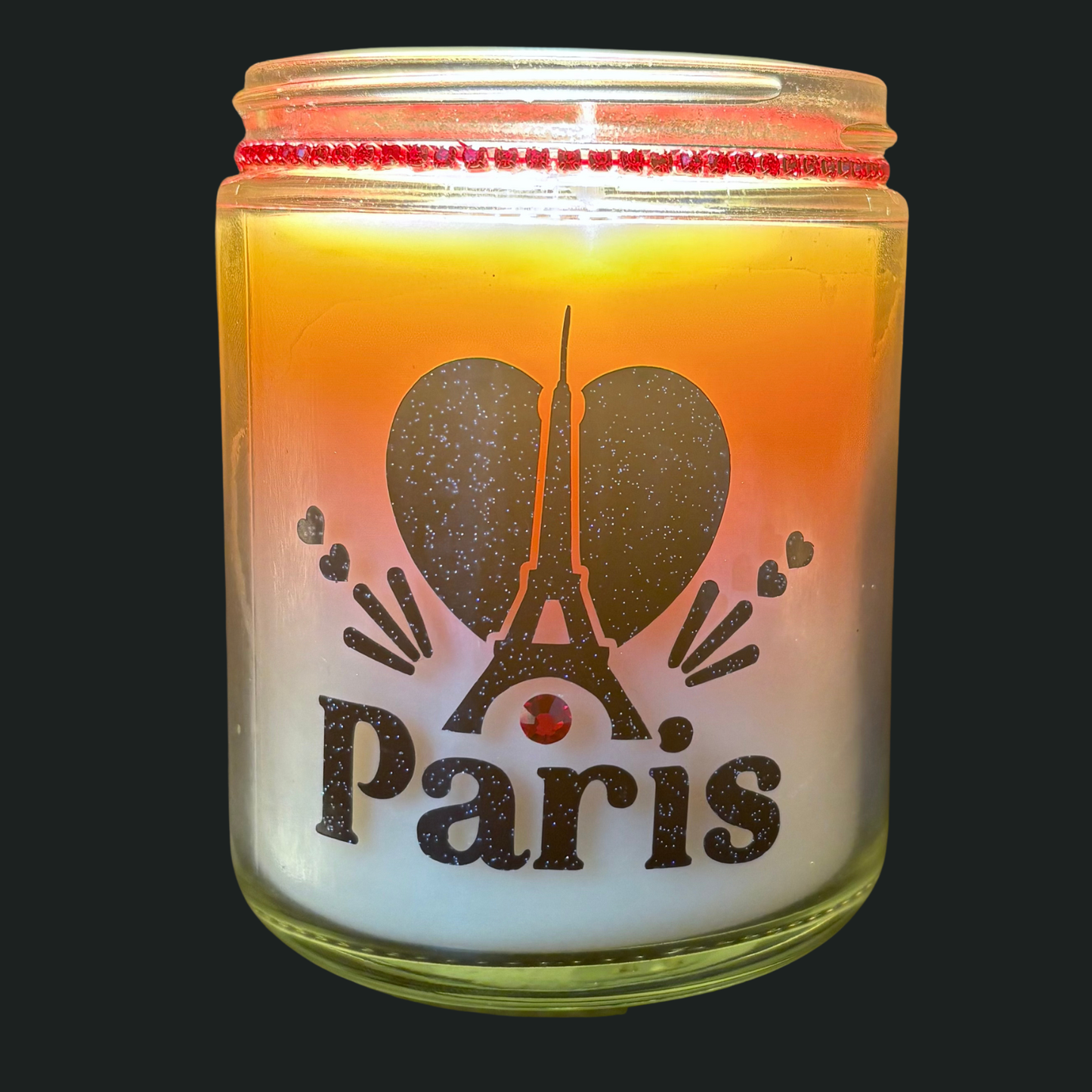 Candle in a jar with 'Paris' design featuring the Eiffel Tower.