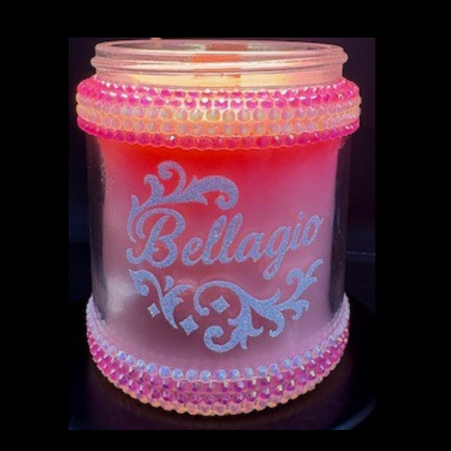 Pink beaded jar with 'Bellagio' text on a dark background