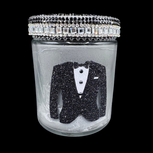 Glass jar with tuxedo design and rhinestone lid on a black background