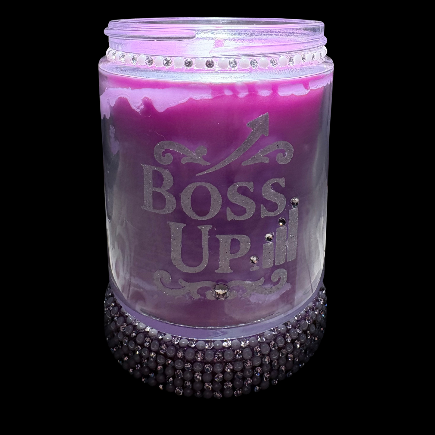 Purple candle jar with 'BOSS UP' text and decorative elements on a black background