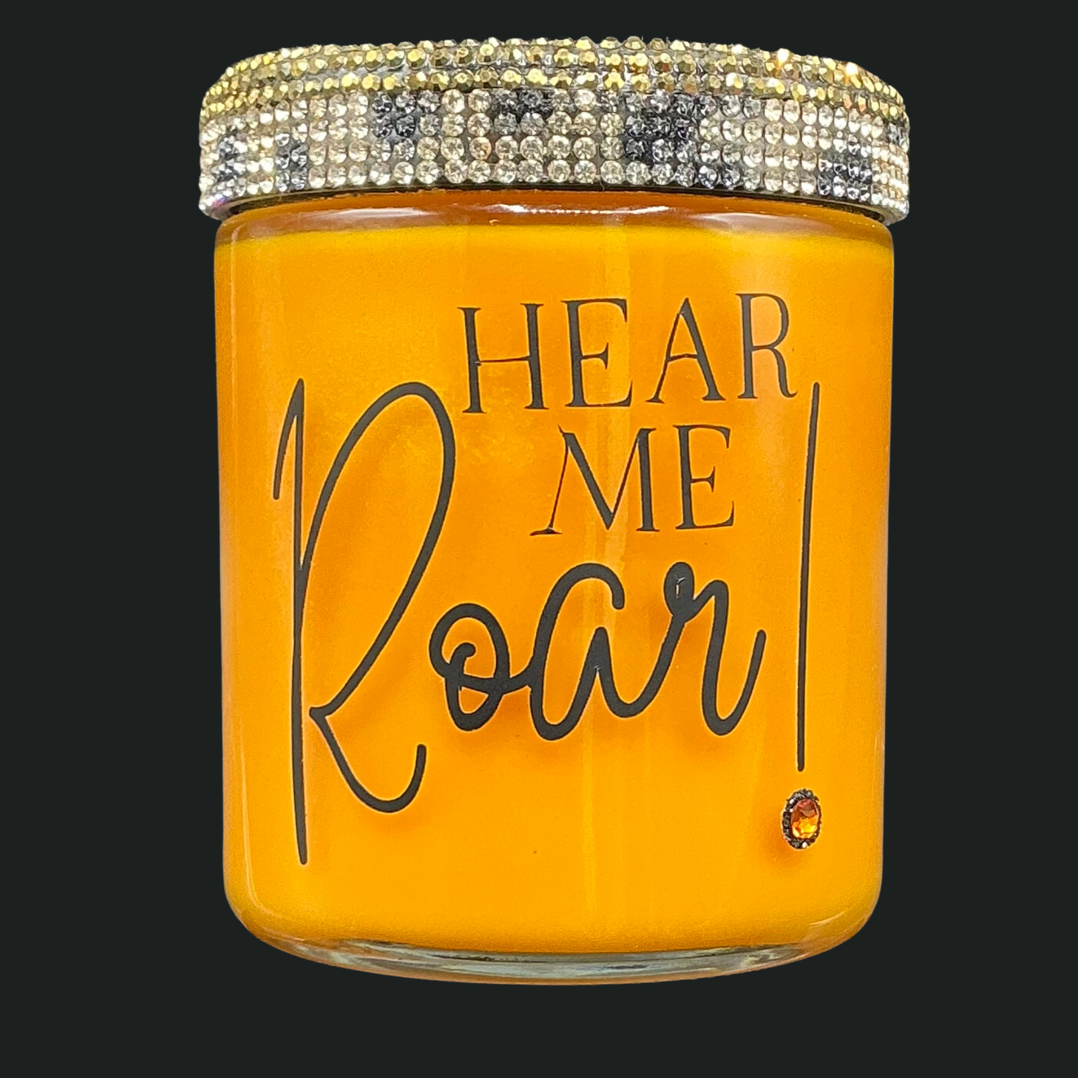 Orange jar with 'HEAR ME ROAR!' text and decorative lid on a black background