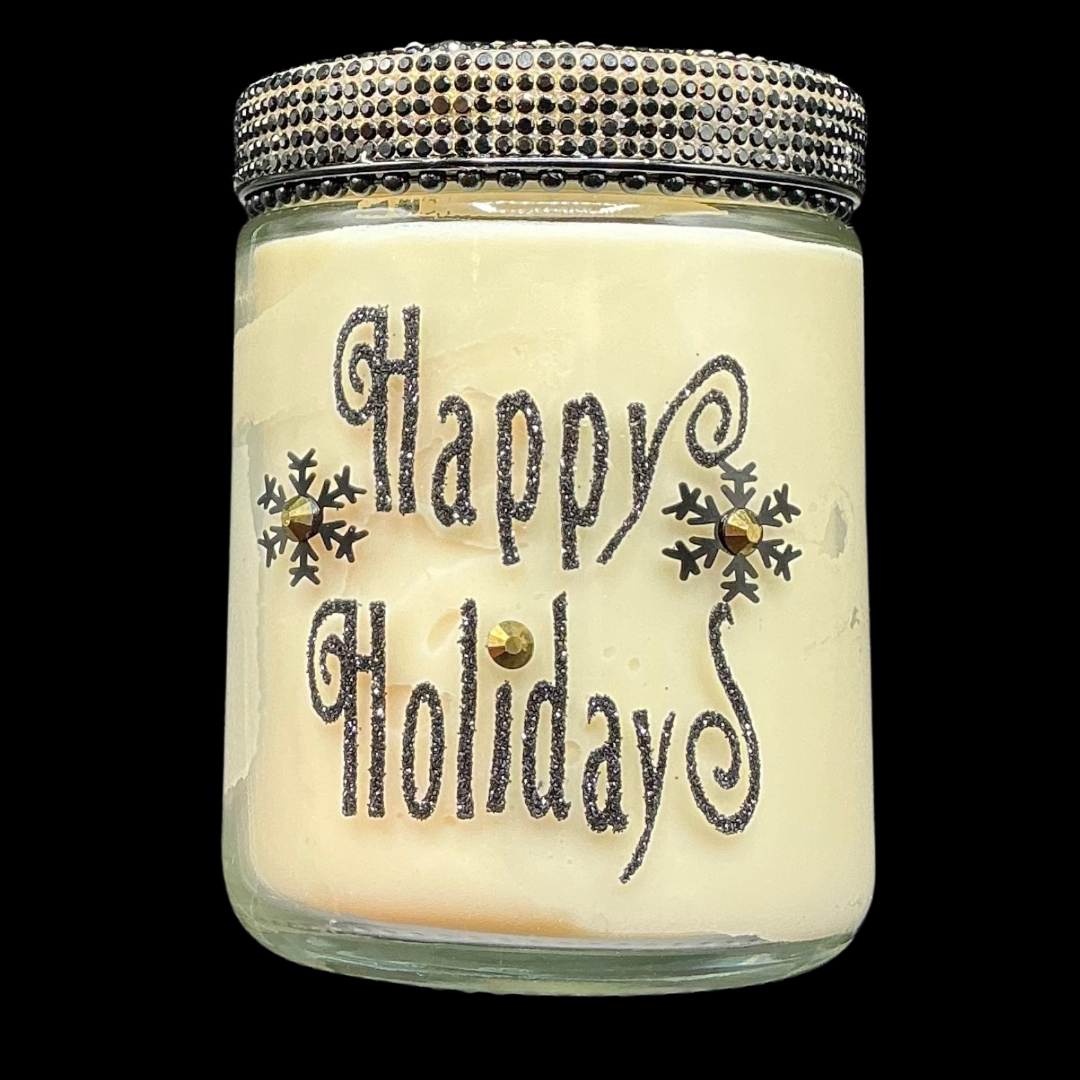 Candle in a glass jar with a decorative lid, featuring 'Happy Holidays' text and snowflake designs.