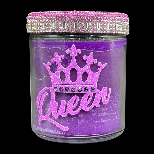Decorative jar with 'Queen' and crown design on a purple background