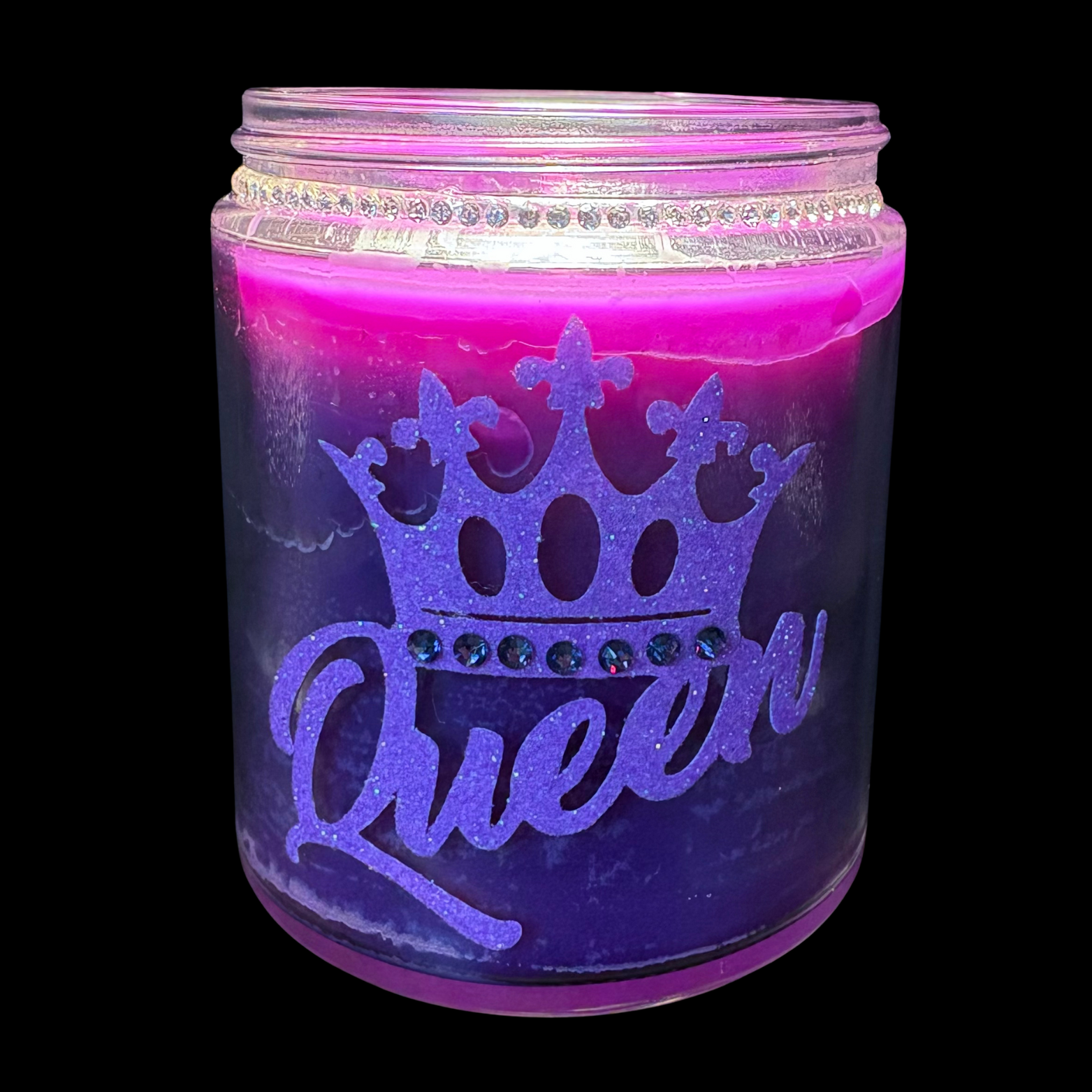 Purple jar with 'Queen' and crown design on a black background