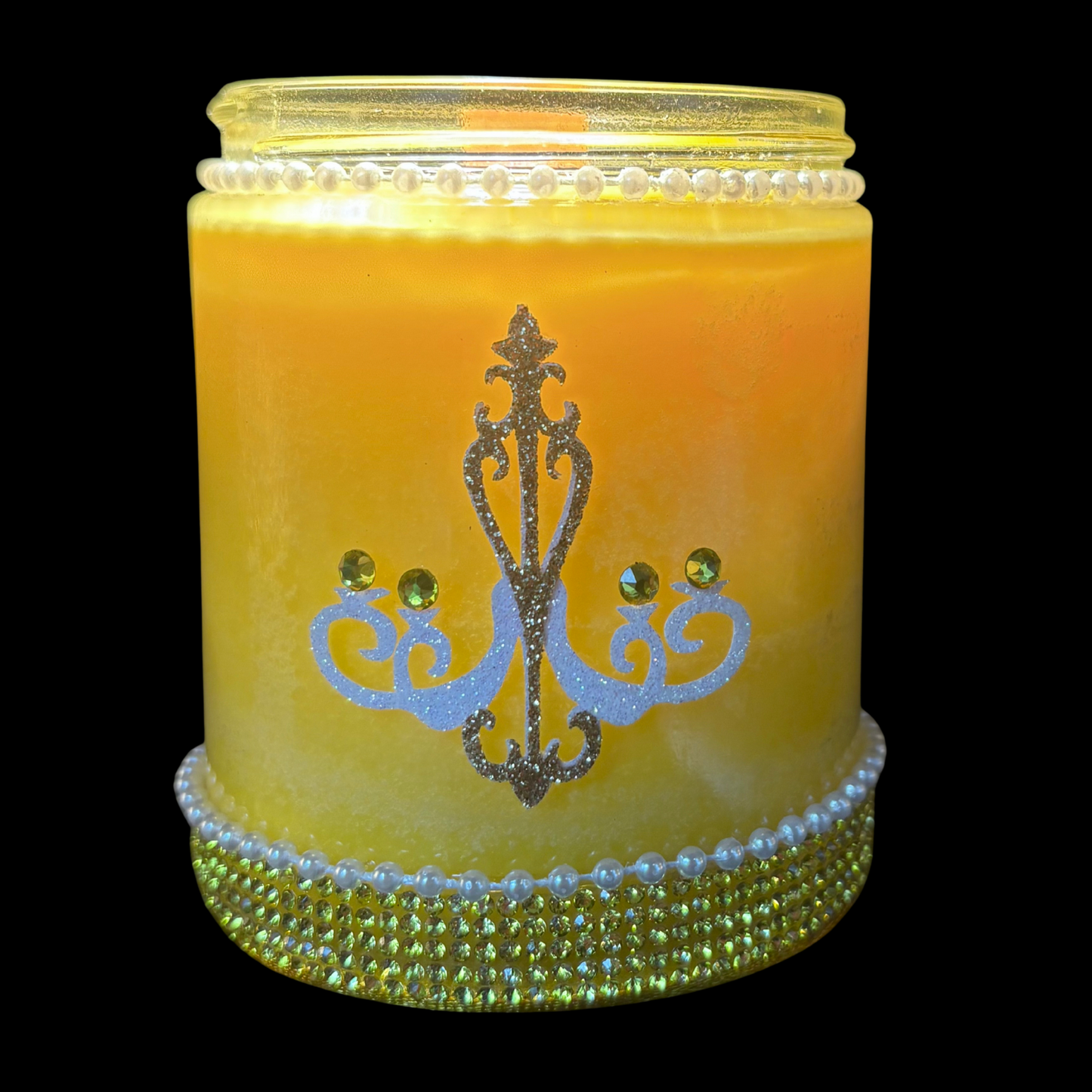 Decorative candle with decorative elements on a black background